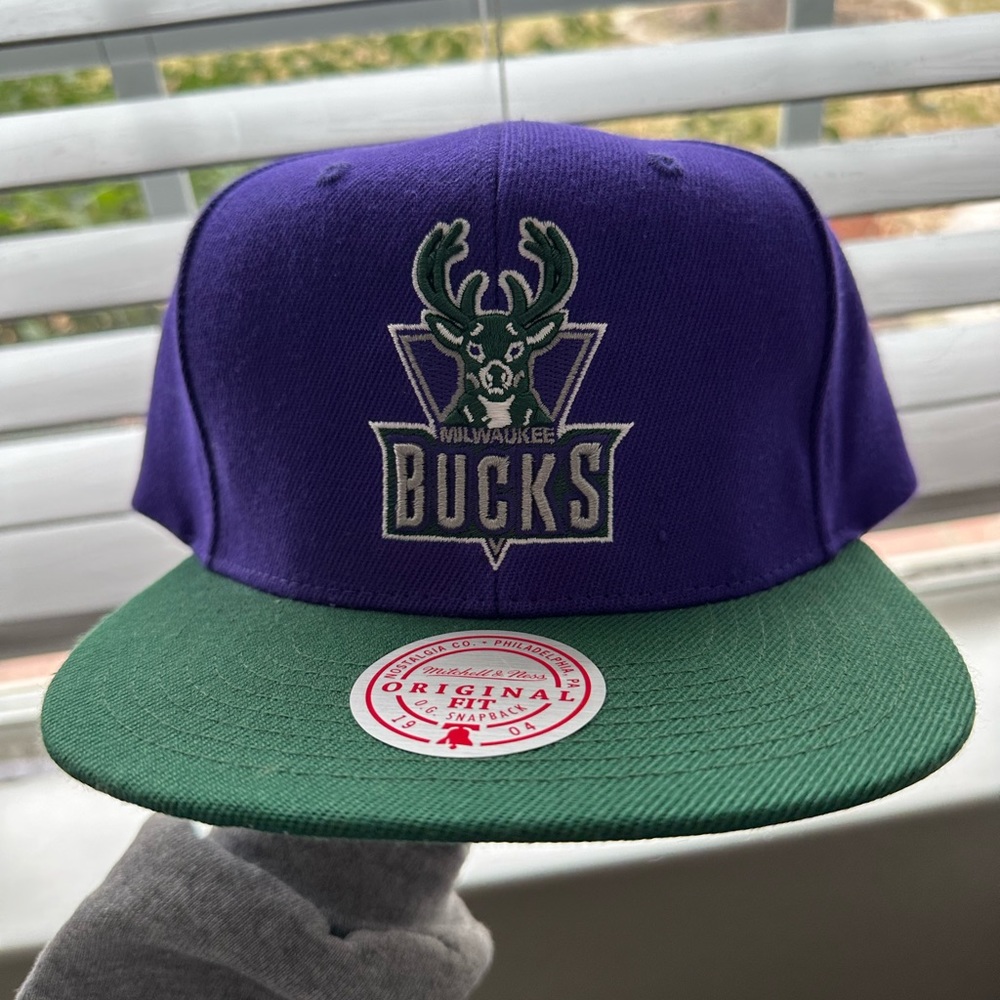 Never worn Milwaukee Bucks snap back hat